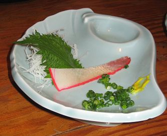 Whale meat is considered a delicacy in Japan. Here, a strip of the meat has been sliced into 'whale bacon'.