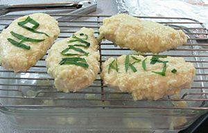 The final coating of chaud-froid, with a decoration of blanched tarragon leaves.