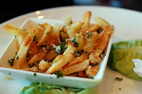 A unique french fry dish served at an upscale restaurant.