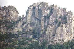 The Seneca Rocks rise across the highway from the town of Mouth of Seneca, West Virginia.